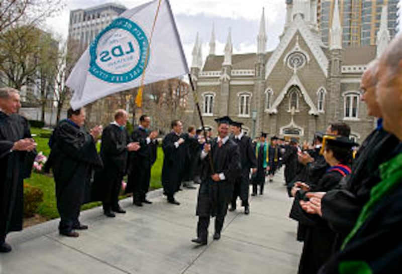 LDS Business College Class of 2011 walk in a procession through Temple Square into the Tabernacle on