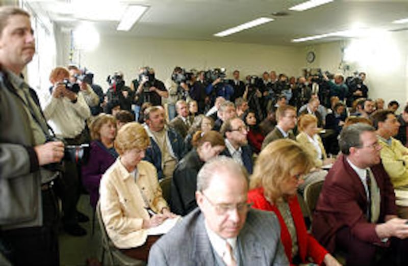 Members of the Media attend a press conference before watching a 13 minute Video and then entering t
