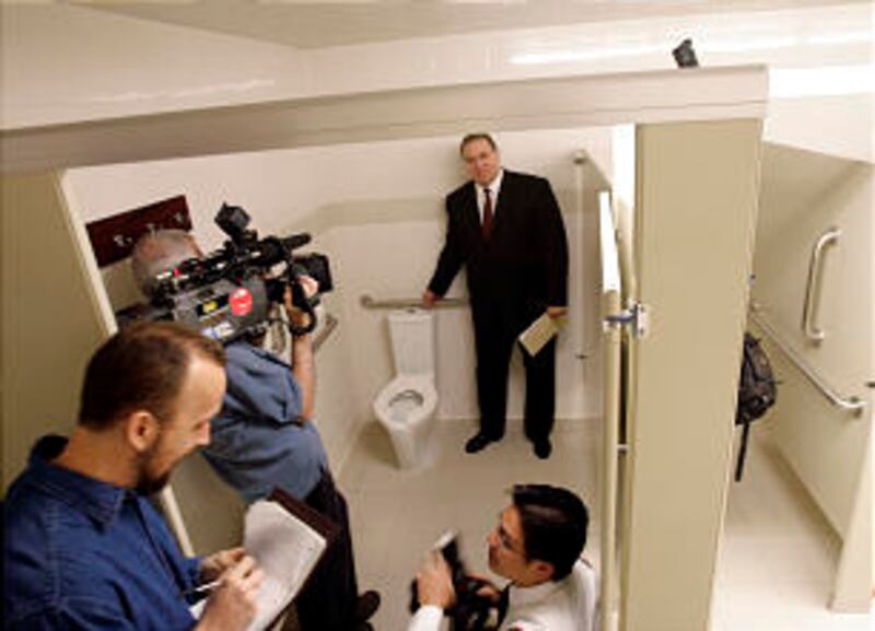 A water-efficient toilet that allows users to control the water flow is displayed by Jared Doxey. Ot