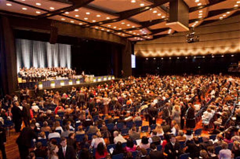 Members assemble for a special meeting with President Thomas S. Monson in Frankfurt on Oct. 21, the