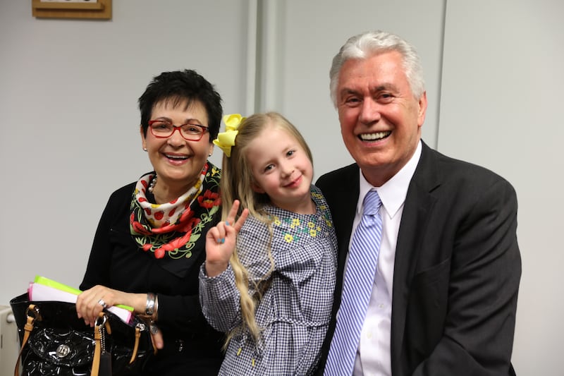 Elder Dieter F. Uchtdorf of the Quorum of the Twelve Apostles and his wife, Sister Harriet Uchtdorft, enjoy a photo moment with Macy Jane McGhie, daughter of Russia Moscow Mission President Jeffrey D. McGhie and Sister Josie McGhie. Photo was taken April 2018 in Moscow.