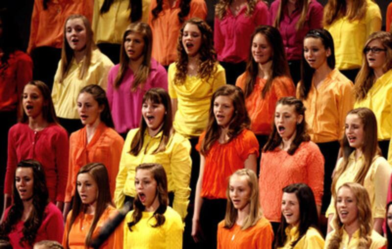 A Young Women choir of stakes from Highland sing at the annual General Young Women Meeting in the Co