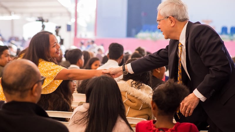 Elder Gerrit W. Gong interacts with Church members ahead of a special conference in Antananarivo, Madagascar, May 24, 2026.