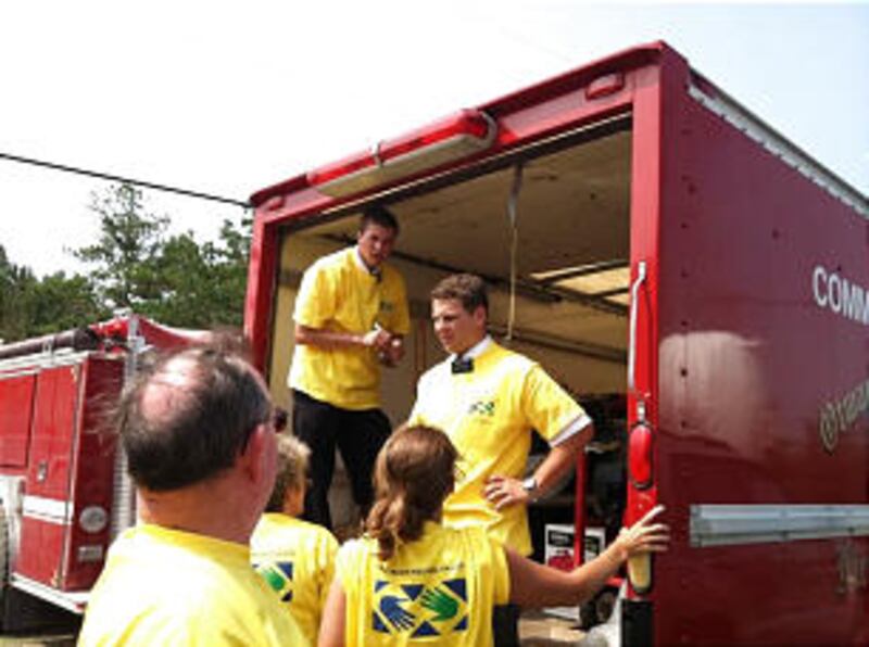 Missionaries and members in North Carolina help to distribute supplies after Hurricane Irene hit alo