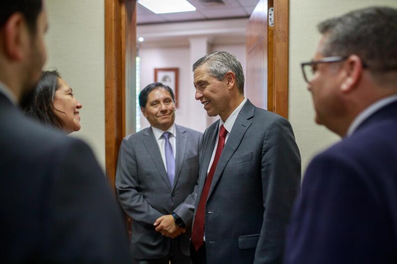 Elder Joaquín E. Costa, a General Authority Seventy and president of the Church’s South America South Area, shakes hands with a Chilean government official in Santiago, Chile, in early February 2026.