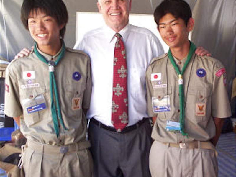 LDS Scouts Shun Komura and Masabume Oe of Japan stand with Elder Hammond