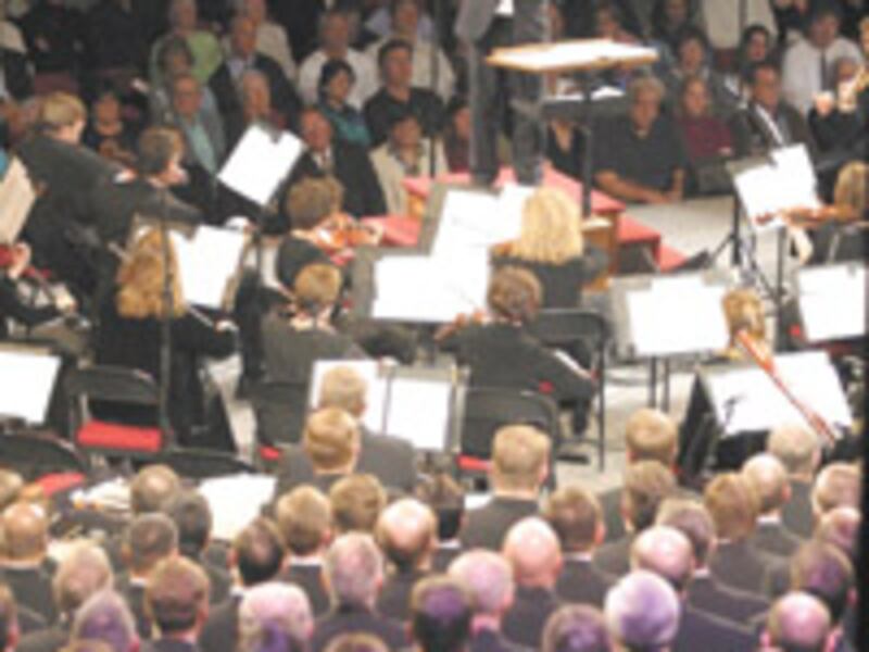 Craig Jessop directs Tabernacle Choir in concert in the Cox Arena in San Diego on Feb. 4.