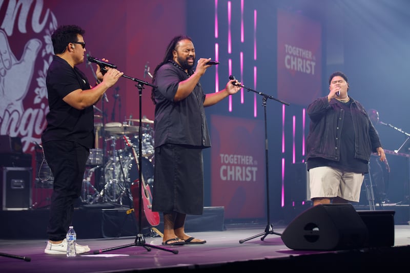Iam Tongi, right, sings at the 2026 Utah Area YSA Conference at the Salt Palace Convention Center in Salt Lake City on Friday, Aug. 14, 2026.