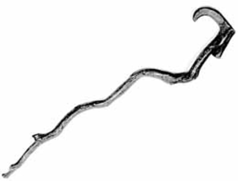 Bent cane once used by Brigham Young. The exhibit also includes photos of well-known people of the e