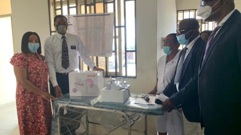Nigeria Port Harcourt Mission President Victor Bassey, second from left, and his spouse, Sister Uche Bassey, far left, accompany other Church leaders and health care workers during a donation of a delivery couch and suction machine to the Etche Health Centre, Port Harcourt, on Tuesday, Dec. 8, 2020, as part of the #LightTheWorld initiative.