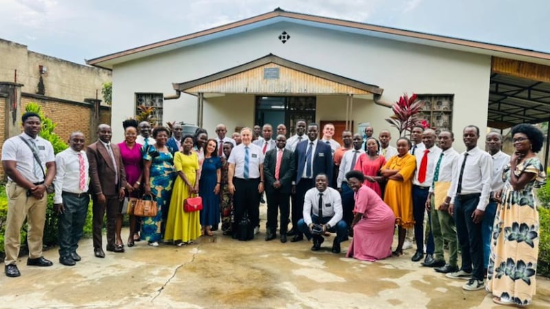 Missionaries and members of the Church gather outside the Bujumbura Burundi District Center on April 16, 2026.