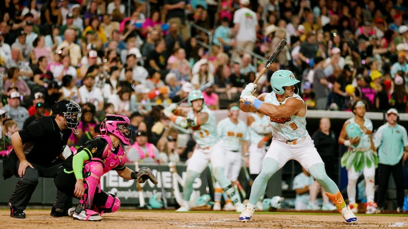 Kaden Bowler, at bat, of the Loco Beach Coconuts, and Bronson Balholm, catcher, of the Party Animals, play in Las Vegas, Nevada, on Friday, May 1, 2026. The Party Animals and the Coconuts are two of six teams in the Banana Ball Championship League.