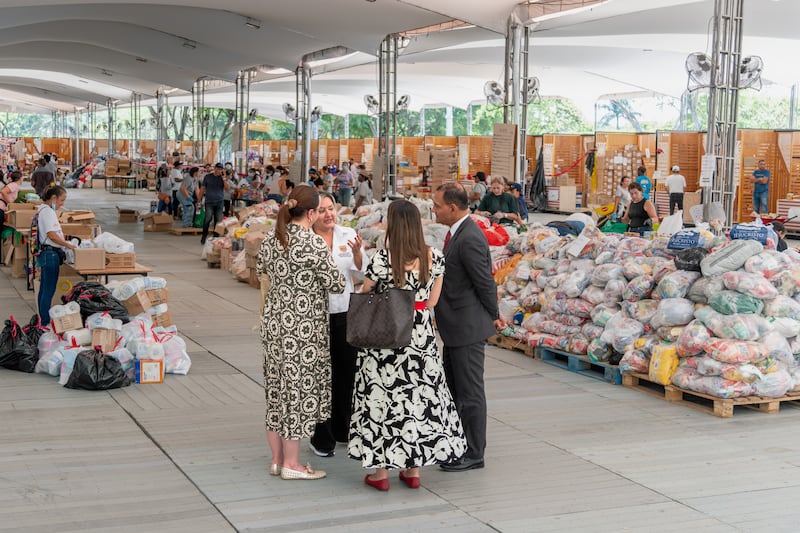 Volunteers help prepare 1,000 food kits for distribution to various areas affected by an earthquake in Cali, Colombia, in August 2026.
