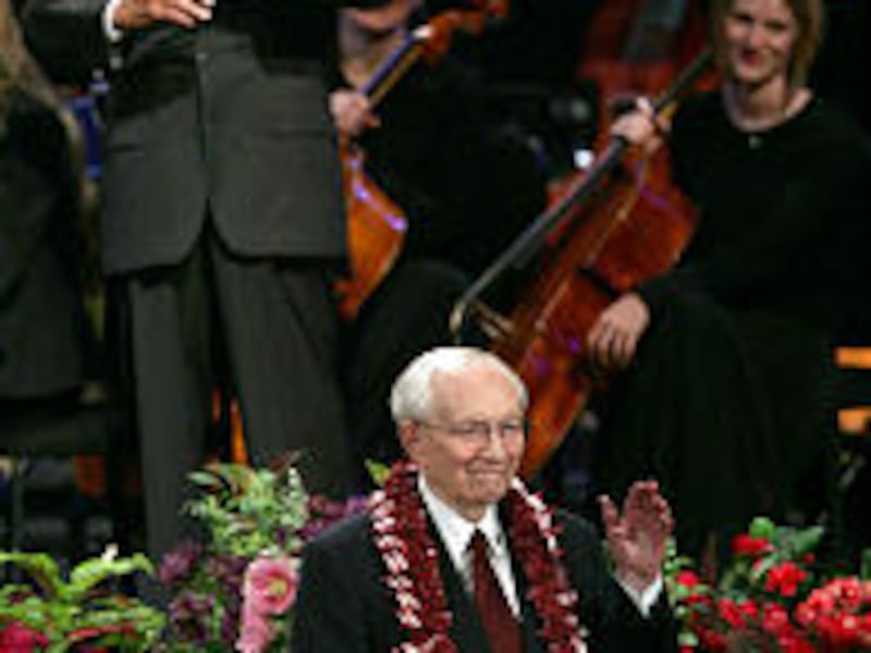 Broadcaster Mike Wallace, top, reacts as President Gordon B. Hinckley greets him and his wife at the