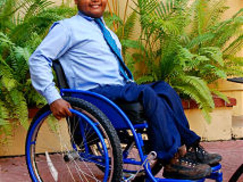 Jose "Riqui" Perez, a young father and polio survivor who lives in Santo Domingo, Dominican Republic