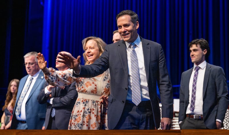Elder B. Corey Cuvelier, a General Authority Seventy, and his wife, Sister Wendi S. Cuvelier, wave to students following a devotional in the I-Center in Rexburg, Idaho, on Tuesday, May 19, 2026.