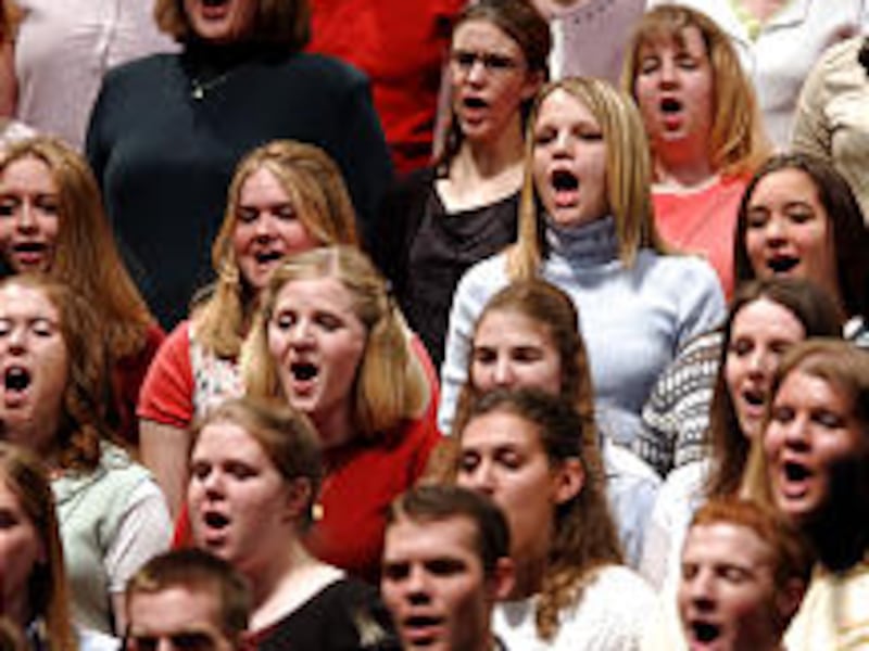 The choir sings during the CES fireside program where President Boyd K. Packer of the Quorom of the