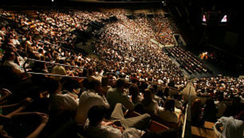 The congregation gathered in the BYU Marriott Center listens to Young Women General President Elaine