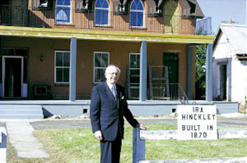 President Gordon B. Hinckley poses near Fillmore home once owned by his grandfather.