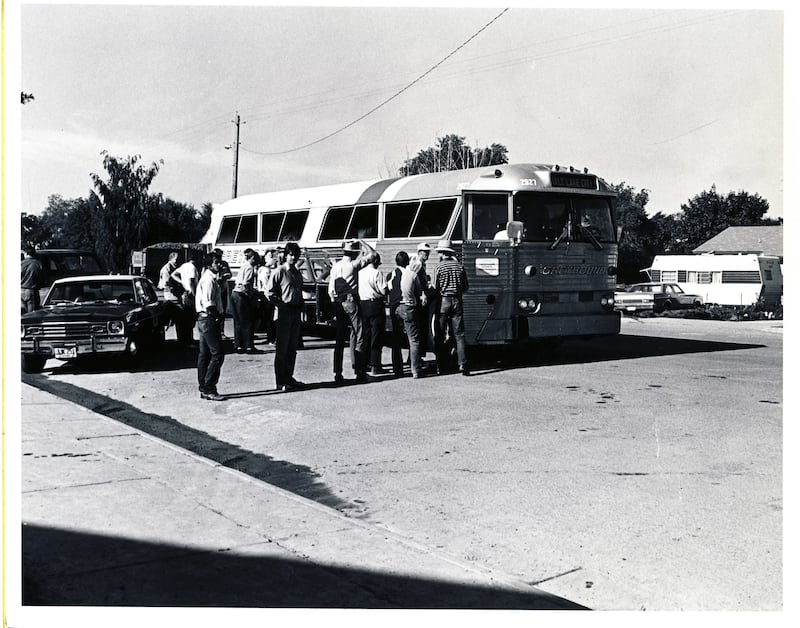 Volunteers from other parts of Idaho, Utah, Wyoming and California arrive by the busload to help with clean-up efforts following the Teton Dam flood.