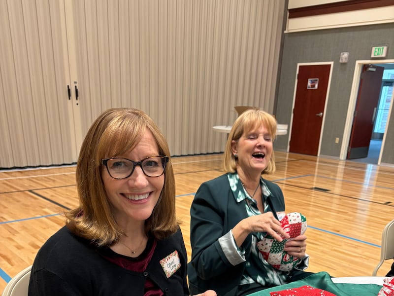 Women of the Round Rock Texas Stake stuff and stitch heart-shaped pillows for children recovering from cardiovascular surgery during the annual Silver Belles luncheon in Cedar Park, Texas, Dec. 3, 2025.