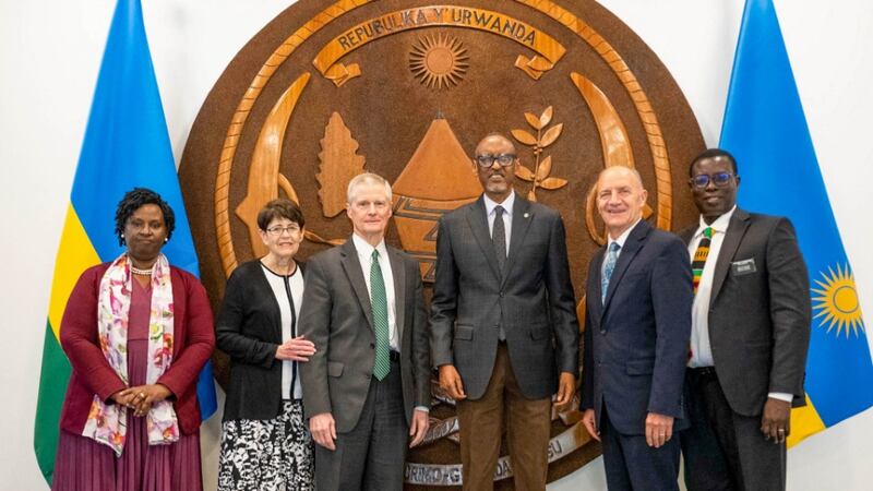 Elder David A. Bednar, Sister Susan Bednar, Elder Paul B. Piper and Rwanda Kigali Mission President John A. Korateng take an official photo with Rwandan President Paul Kagame and Usta Kayitesi of the Ministry of Foreign Affairs.