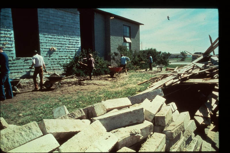 Volunteers from Idaho, Utah, Wyoming and elsewhere help haul away debris following the Teton Dam flood in summer 1976.