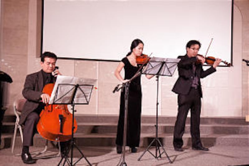 Performers BooMin Do, cello; SunGee Lee, violin; JongHun Kim, violin at the Korea Mission 50th anniv