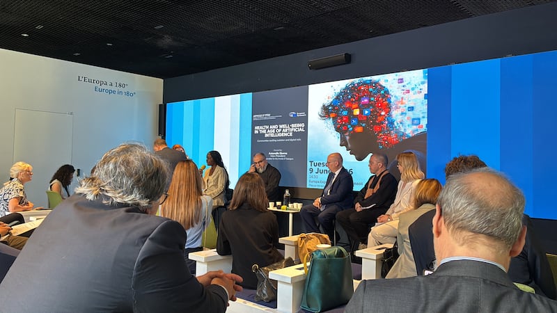 Individuals gather to listen to a panel discussion on June 9th, 2026 at the European Parliament Liaison Office in Rome, Italy.