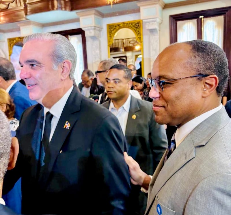 Elder Ahmad S. Corbitt, a General Authority Seventy and a member of the Caribbean Area presidency, stands with Dominican Republic President Luis Abinder at a national day of prayer and thanksgiving interfaith event held Sept. 7, 2026, in the Hall of Caryatids at the National Palace in Santo Domingo, Dominican Republic.