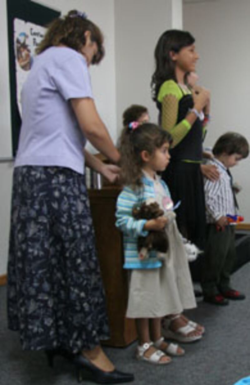 Primary children and their leaders participate in sharing time in the Pocuro Ward, Santiago Chile La