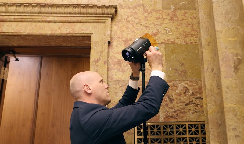 Church photographer Cody Bell sets up for a photo shoot at the Church Administration Building in Salt Lake City, Utah.