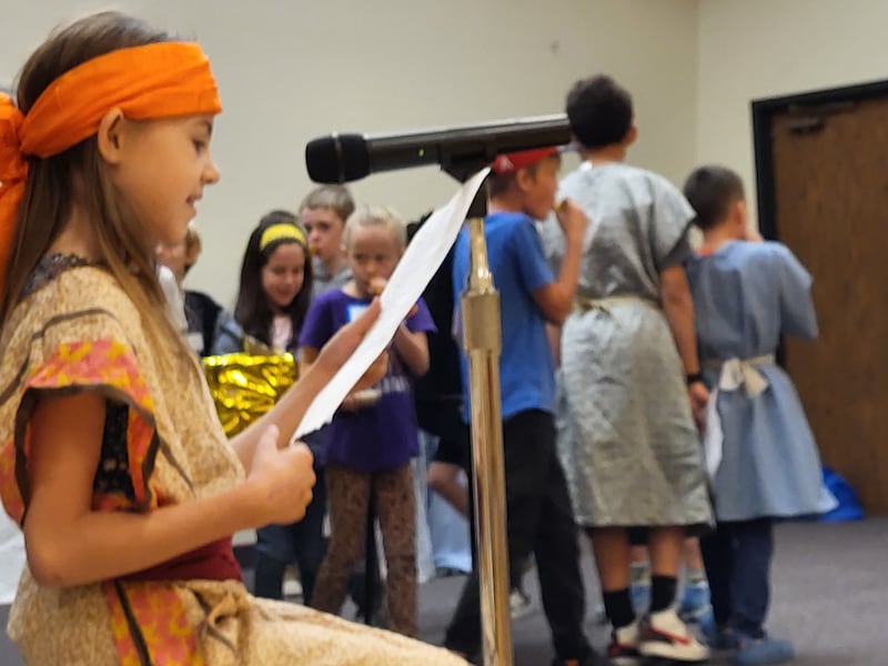 Valiant-age children in the Orem Utah Stake take part in a skit about Joshua and the battle of Jericho during a Primary activity in Orem, Utah, on March 14, 2026.